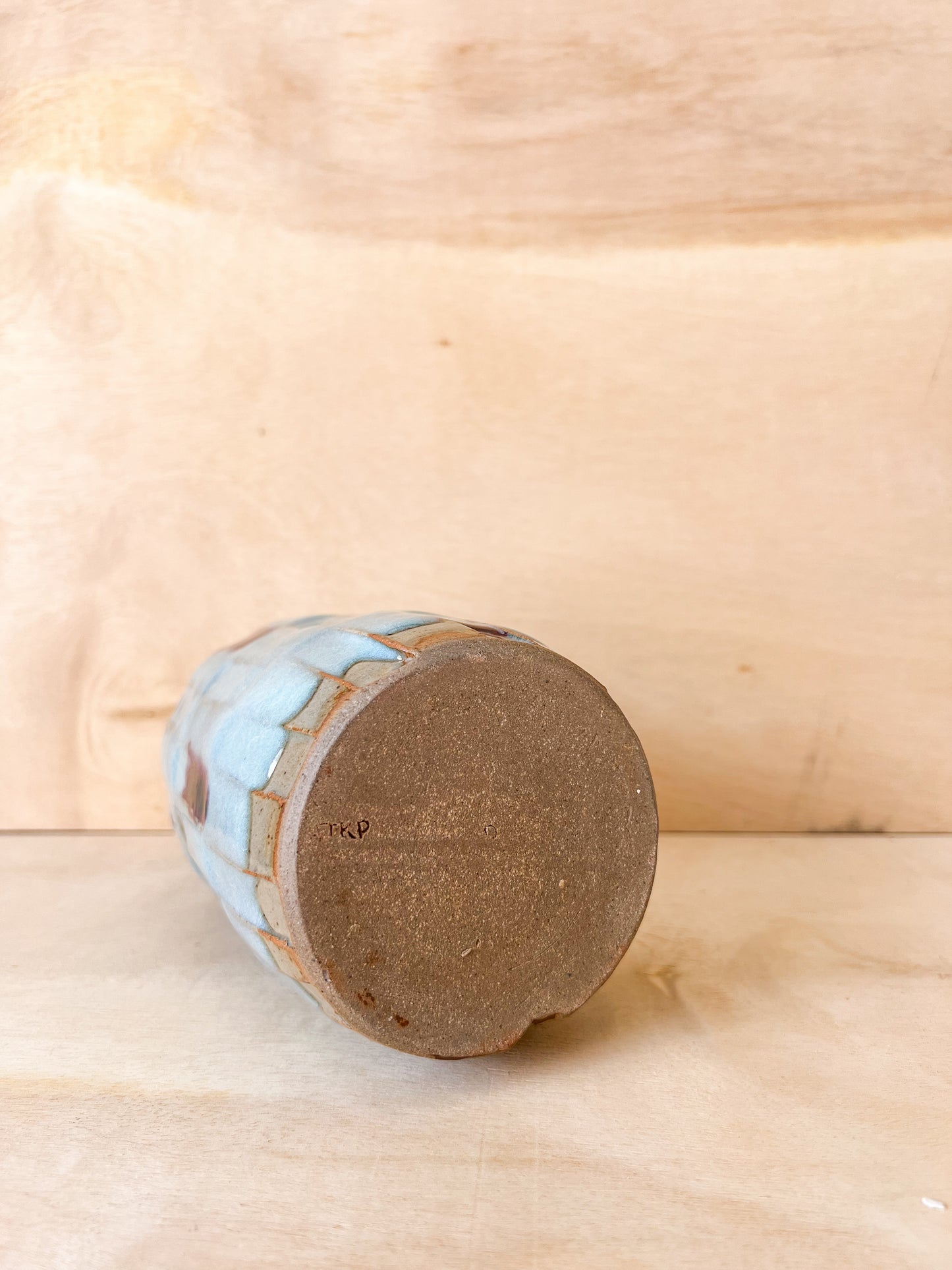 Carved Bottle in Blue with Red Wash