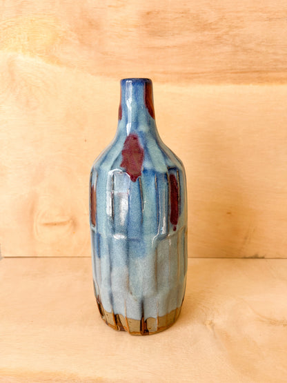 Carved Bottle in Blue with Red Wash