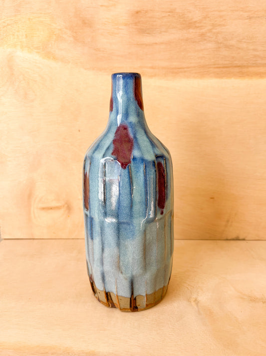 Carved Bottle in Blue with Red Wash